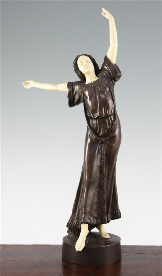 Peter Tereszczuk (Austrian, 1875-1963). A patinated bronze and ivory figure of a young lady dancing, 16.75in.